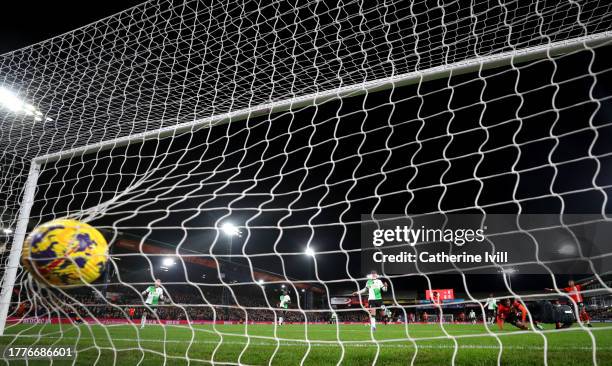 Tahith Chong of Luton Town scores the team's first goal during the Premier League match between Luton Town and Liverpool FC at Kenilworth Road on...