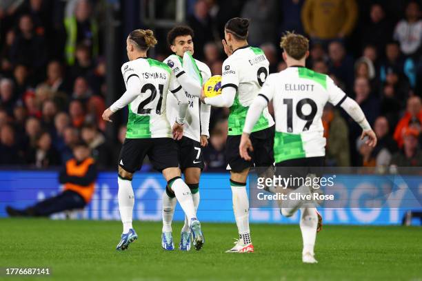 Luis Diaz of Liverpool celebrates with Kostas Tsimikas, Darwin Nunez and Harvey Elliott of Liverpool after scoring the team's first goal to equalise...