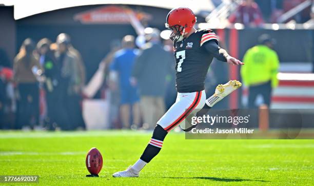 Dustin Hopkins of the Cleveland Browns takes the opening kick-off during the game against the Arizona Cardinals at Cleveland Browns Stadium on...