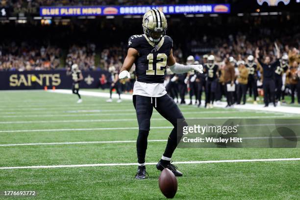 Chris Olave of the New Orleans Saints celebrates after a touchdown during the first quarter in the game against the Chicago Bears at Caesars...