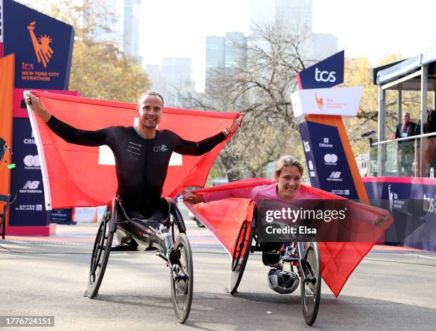 Marcel Hug and Catherine Debrunner of Switzerland celebrates after winning the gold in the Wheelchair Division during the 2023 TCS New York City...