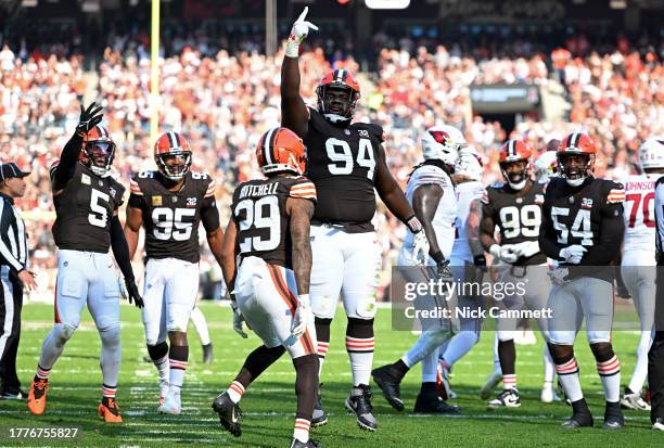 Dalvin Tomlinson of the Cleveland Browns celebrates a sack against the Arizona Cardinals during the first half of the game at Cleveland Browns...