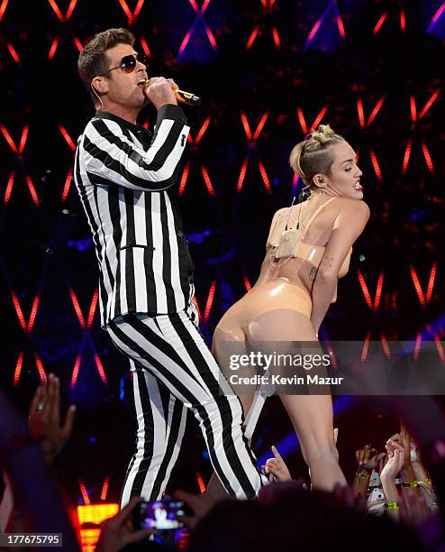 Robin Thicke and Miley Cyrus perform during the 2013 MTV Video Music Awards at the Barclays Center on August 25, 2013 in the Brooklyn borough of New...