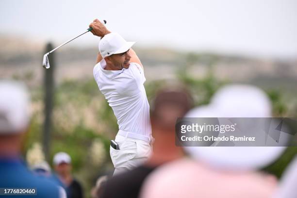 Camilo Villegas of Colombia hits a tee shot on the ninth hole during the final round of the World Wide Technology Championship at El Cardonal at...