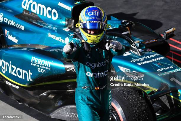 Third placed Fernando Alonso of Spain and Aston Martin F1 Team celebrates in parc ferme during the F1 Grand Prix of Brazil at Autodromo Jose Carlos...