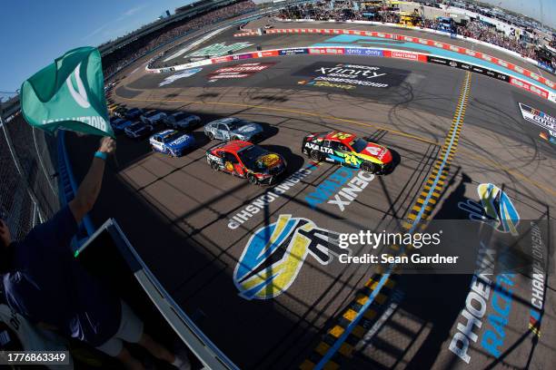 William Byron, driver of the Axalta Chevrolet, leads the field to the green flag to start the NASCAR Cup Series Championship at Phoenix Raceway on...