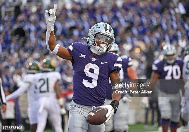 Running back Treshaun Ward of the Kansas State Wildcats reacts after scoring a touchdown against the Baylor Bears in the second half at Bill Snyder...