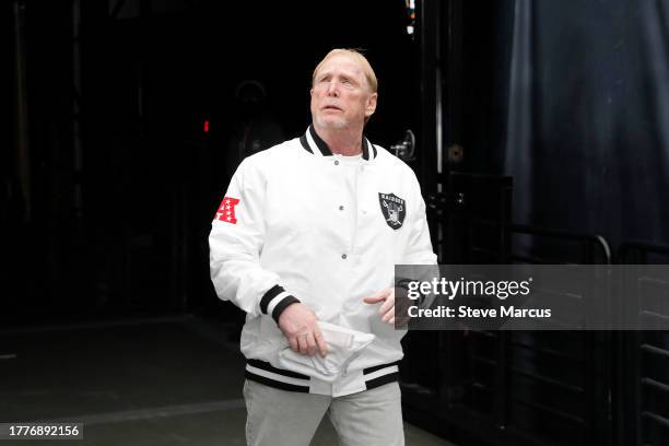 Las Vegas Raiders owner and managing general partner Mark Davis takes the field before a game against the New York Giants at Allegiant Stadium on...