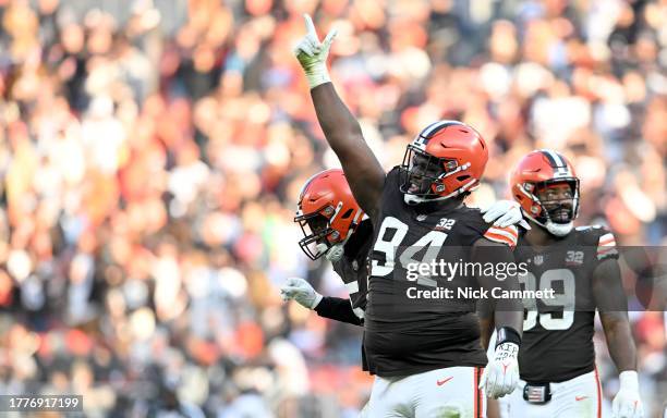 Dalvin Tomlinson of the Cleveland Browns celebrates after a sack during the fourth quarter of the game against the Arizona Cardinals at Cleveland...