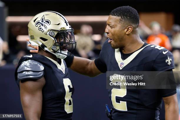 Marcus Maye of the New Orleans Saints celebrates with teammate Jameis Winston after an interception against the Chicago Bears during the fourth...