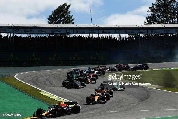 Max Verstappen of the Netherlands driving the Oracle Red Bull Racing RB19 leads the field at the restart after a red flag delay during the F1 Grand...