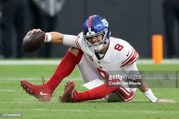 Daniel Jones of the New York Giants reacts after falling down in the first quarter of a game against the Las Vegas Raiders at Allegiant Stadium on...