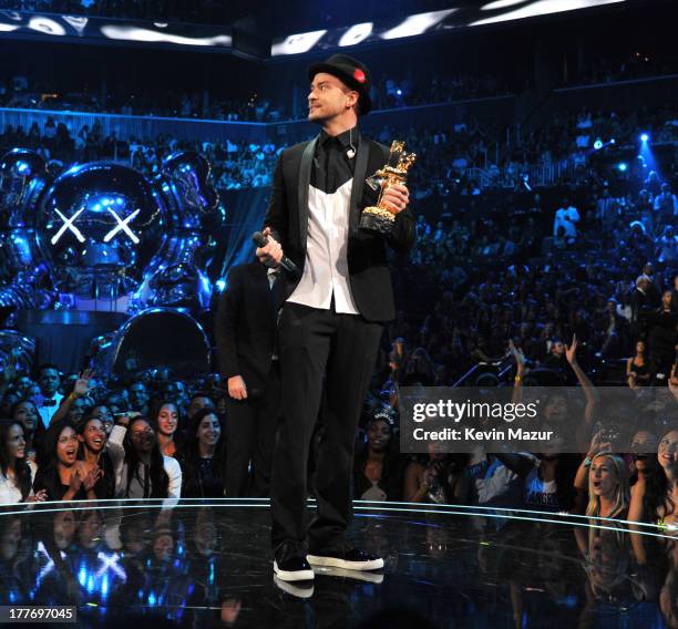 Justin Timberlake accepts the Michael Jackson Video Vanguard Award during the 2013 MTV Video Music Awards at the Barclays Center on August 25, 2013...