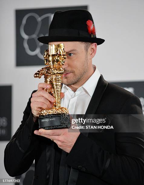 Justin Timberlake with the Michael Jackson Video Vanguard Award at the MTV Video Music Awards August 25, 2013 at the Barclays Center in New York. AFP...