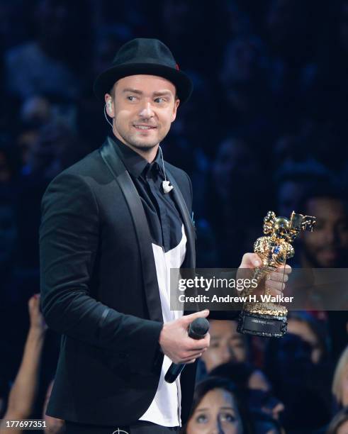 Justin Timberlake accepts the Michael Jackson Video Vanguard Award during the 2013 MTV Video Music Awards at the Barclays Center on August 25, 2013...