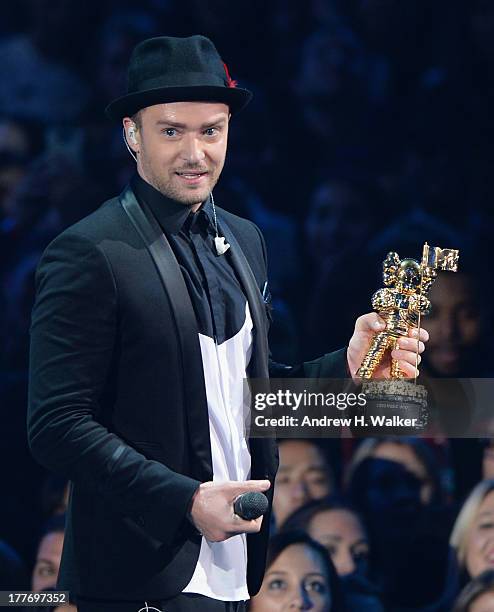 Justin Timberlake accepts the Michael Jackson Video Vanguard Award during the 2013 MTV Video Music Awards at the Barclays Center on August 25, 2013...