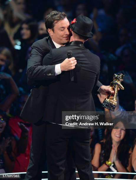 Jimmy Fallon presents Justin Timberlake the Michael Jackson Video Vanguard Award during the 2013 MTV Video Music Awards at the Barclays Center on...