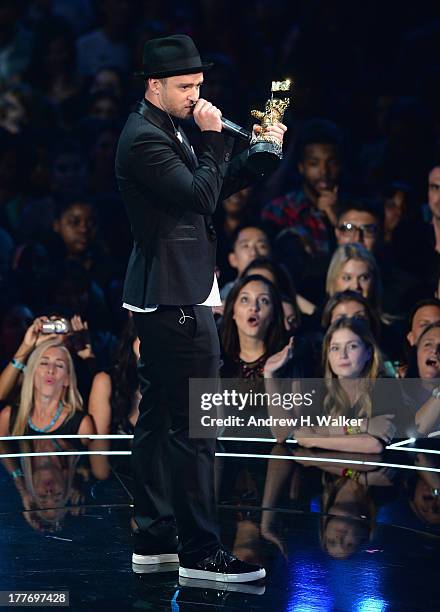 Justin Timberlake accepts the Michael Jackson Video Vanguard Award during the 2013 MTV Video Music Awards at the Barclays Center on August 25, 2013...