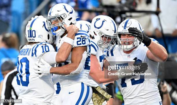 Jonathan Taylor of the Indianapolis Colts celebrates with Gardner Minshew of the Indianapolis Colts after scoring a touchdown during the second...