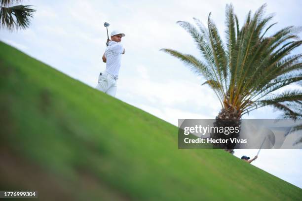 Camilo Villegas of Colombia hits a tee shot on the 17th hole during the final round of the World Wide Technology Championship at El Cardonal at...