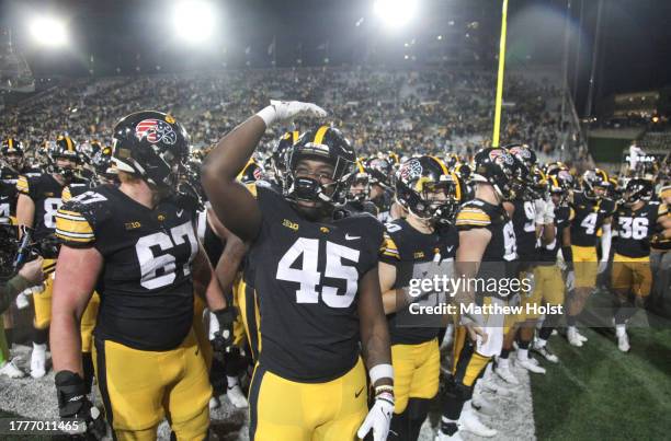 Defensive lineman Deontae Craig of the Iowa Hawkeyes celebrates as the team leaves the field ate the match-up against the Rutgers Scarlet Knights at...