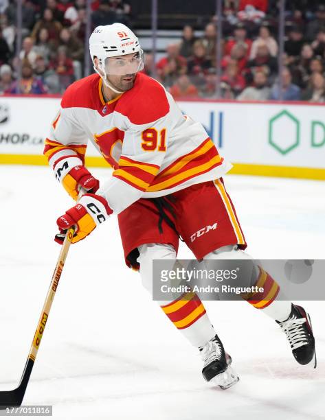 Nazem Kadri of the Calgary Flames skates against the Ottawa Senators at Canadian Tire Centre on November 11, 2023 in Ottawa, Ontario, Canada.