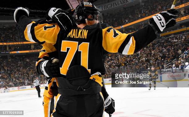 Evgeni Malkin of the Pittsburgh Penguins celebrates his first period goal against the Buffalo Sabres at PPG PAINTS Arena on November 11, 2023 in...