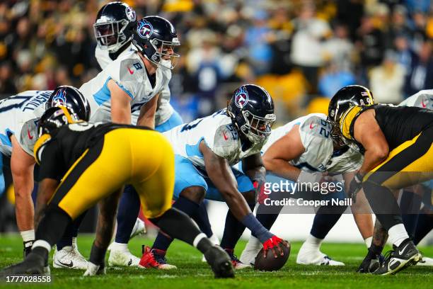 Aaron Brewer of the Tennessee Titans lines up during an NFL football game against the Pittsburgh Steelers at Acrisure Stadium on November 2, 2023 in...