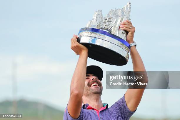 Erik van Rooyen of South Africa hoists the trophy after winning the final round of the World Wide Technology Championship at El Cardonal at Diamante...