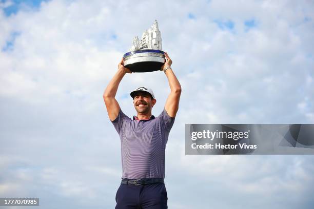 Erik van Rooyen of South Africa poses for a photo with the trophy after winning the final round of the World Wide Technology Championship at El...