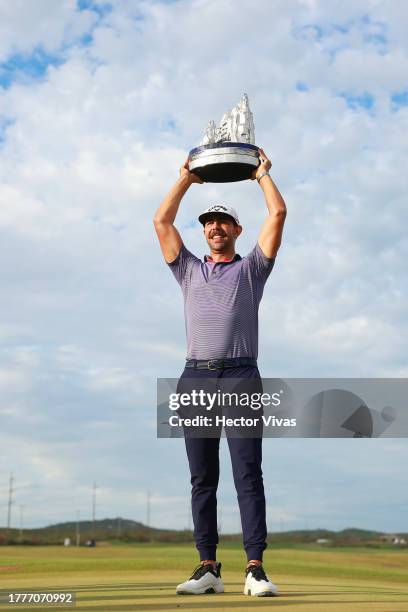 Erik van Rooyen of South Africa poses for a photo with the trophy after winning the final round of the World Wide Technology Championship at El...