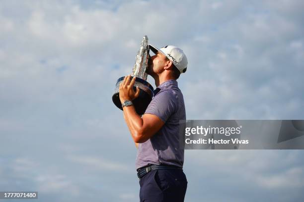 Erik van Rooyen of South Africa kisses the trophy after winning the final round of the World Wide Technology Championship at El Cardonal at Diamante...