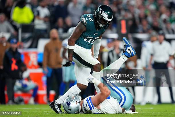 Zach Cunningham of the Philadelphia Eagles reacts over Jake Ferguson of the Dallas Cowboys during the third quarter at Lincoln Financial Field on...