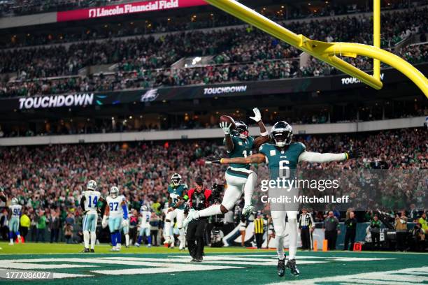 Brown of the Philadelphia Eagles celebrates after a touchdown with DeVonta Smith during the second half in the game against the Dallas Cowboys at...