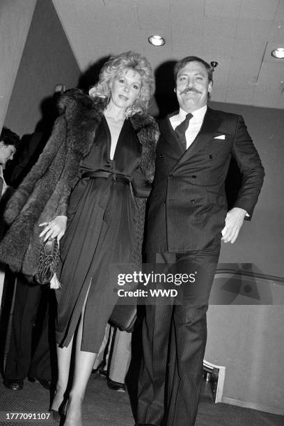 Jill Donahue and Stacy Keach attend an event at the Seventh Regiment Armory in New York City on December 9, 1982.