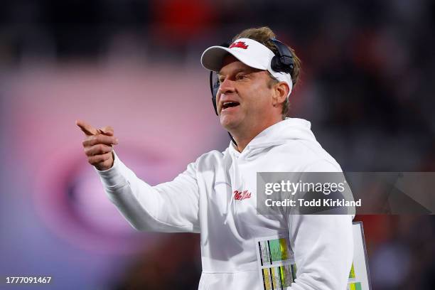 Head coach Lane Kiffin of the Mississippi Rebels looks on during the first half against the Georgia Bulldogs at Sanford Stadium on November 11, 2023...