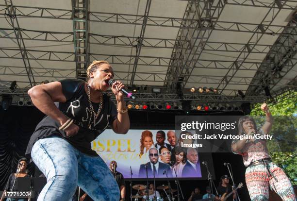 Americna Gospel singers Kierra Sheard and Erica Campbell, one-half of Gospel group Mary Mary, perform at the WLIB 6th Annual Gospel Explosion at...