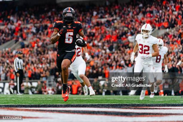 Running back Damien Martinez of the Oregon State Beavers scores on a 15 yard touchdown rush during the first half of the game against the Stanford...