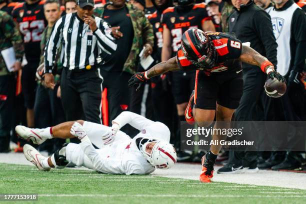 Running back Damien Martinez of the Oregon State Beavers manages to stay in bounds after catching a pass during the second half of the game against...