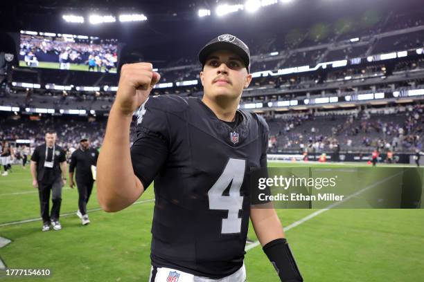 Aidan O'Connell of the Las Vegas Raiders gestures as he leaves the field after the Raiders defeated the New York Giants 30-6 at Allegiant Stadium on...