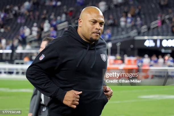 Interim head coach Antonio Pierce of the Las Vegas Raiders runs off the field after the Raiders defeated the New York Giants 30-6 at Allegiant...