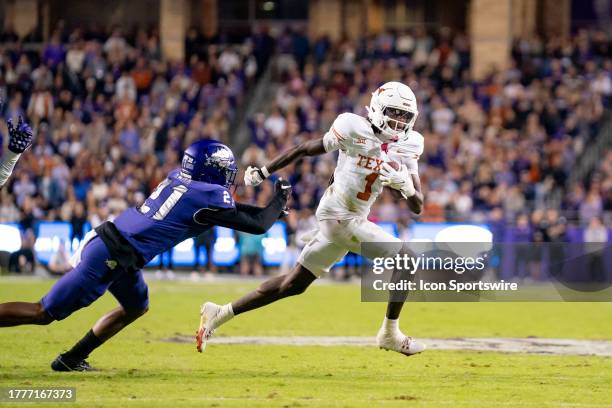 Texas Longhorns wide receiver Xavier Worthy makes a defender miss during a game between the Texas Longhorns and TCU Horned Frogs college football...