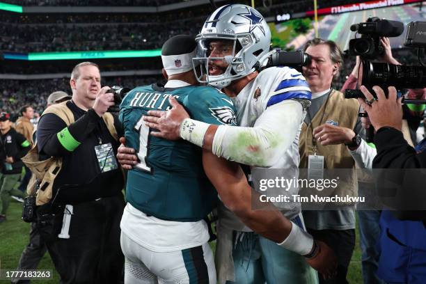 Jalen Hurts of the Philadelphia Eagles and Dak Prescott of the Dallas Cowboys embrace after the game at Lincoln Financial Field on November 05, 2023...