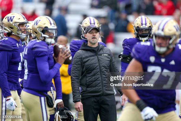 November 11: Washington offensive coordinator Ryan Grubb watch the team before a college football game between the Washington Huskies and the Utah...