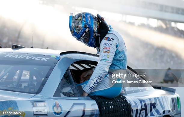 Kevin Harvick, driver of the Busch Light Harvick Ford, exits his car after the NASCAR Cup Series Championship at Phoenix Raceway on November 05, 2023...