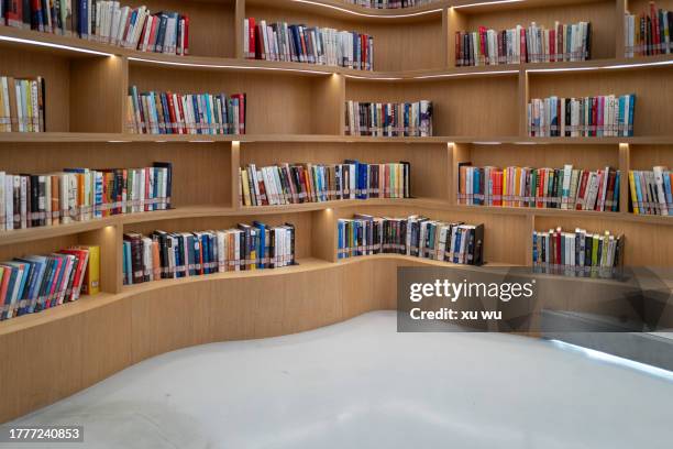 interior space, rows of bookcases in the library - public library stock pictures, royalty-free photos & images
