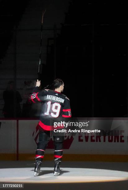 Drake Batherson of the Ottawa Senators salutes the crowd after being named first star of the game against the Calgary Flames at Canadian Tire Centre...