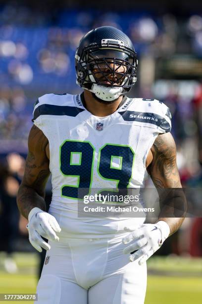 Leonard Williams of the Seattle Seahawks looks on as he warms up prior to an NFL football game between the Baltimore Ravens and the Seattle Seahawks...