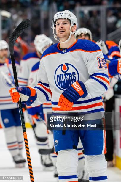 Zach Hyman of the Edmonton Oilers celebrates after completing a natural hat trick during the first period of a game against the Seattle Kraken at...