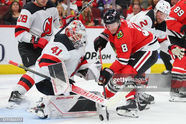Ryan Donato of the Chicago Blackhawks scores a goal past Vitek Vanecek of the New Jersey Devils during the third period at the United Center on...